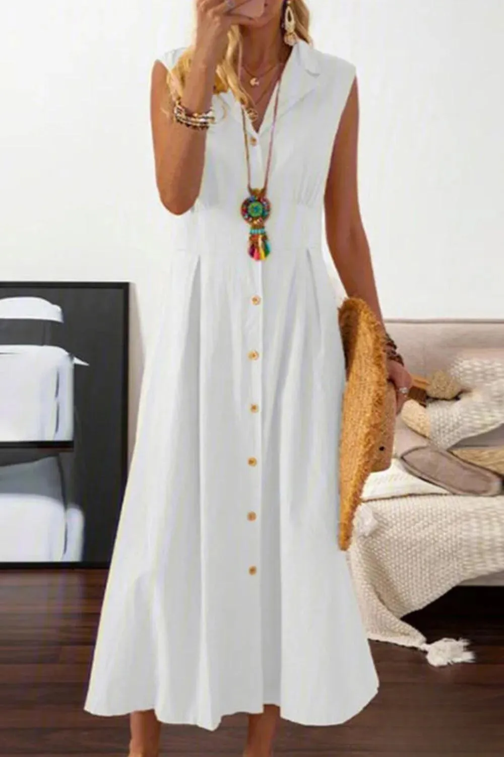 Peggy - sleeveless midi dress with overlap buttons.