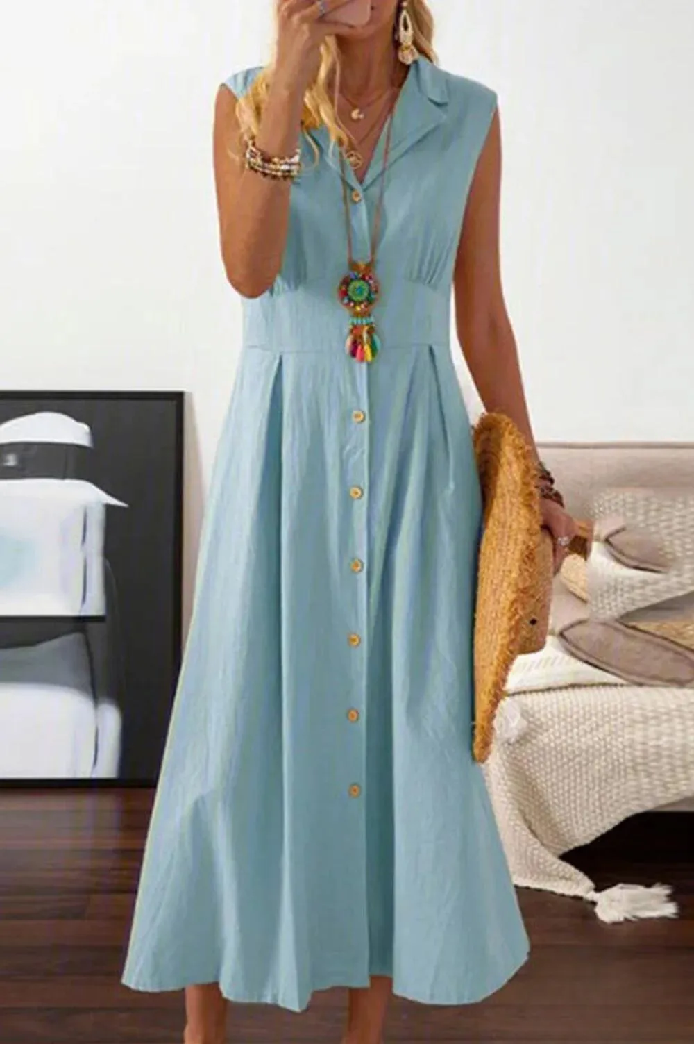 Peggy - sleeveless midi dress with overlap buttons.