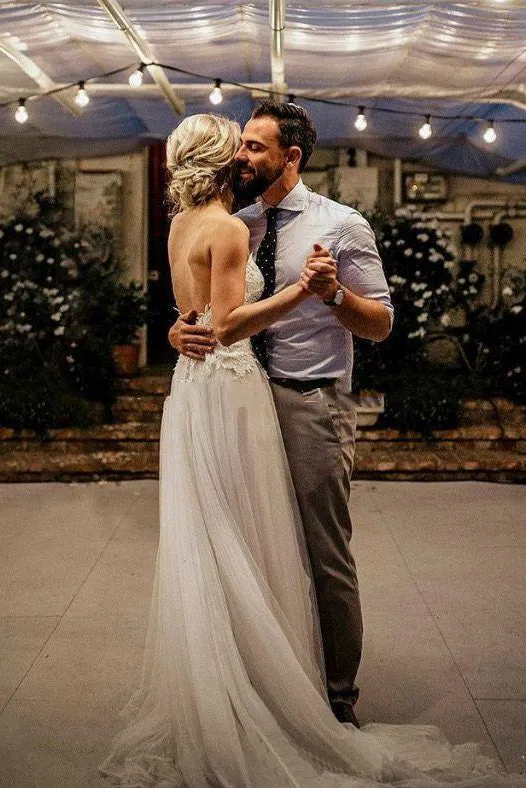 Tulle Wedding Dress With Deep V-neck Open Back And Flowers And Lace Appliques